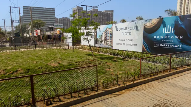 Adani Downtown Avenue — site photograph, signage work as on April 2025